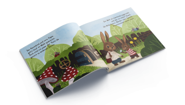 Ansicht Kinderbuch "Die Welt ist manchmal ungerecht" Aufgeschlagenes Kinderbuch "Die Welt ist manchmal ungerecht" mit Illustationen von zwei Hasen.